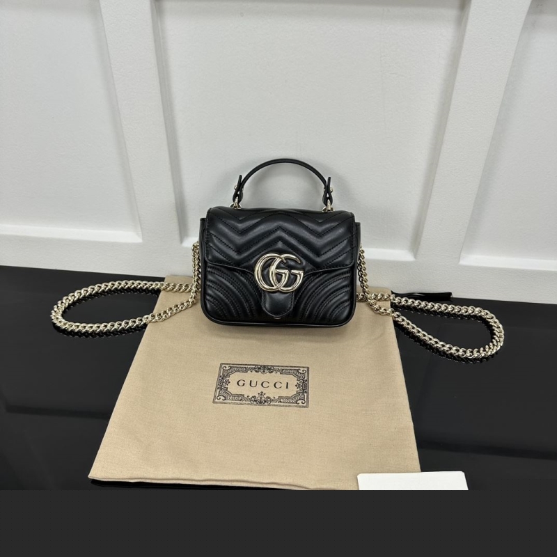 G*u*i top handle bags